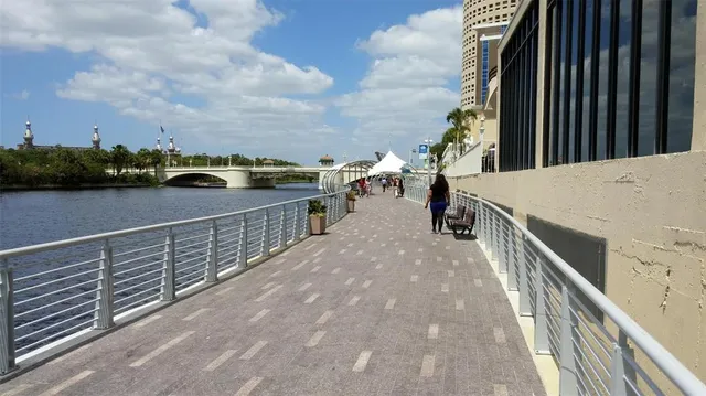 a view of swimming pool with outdoor seating