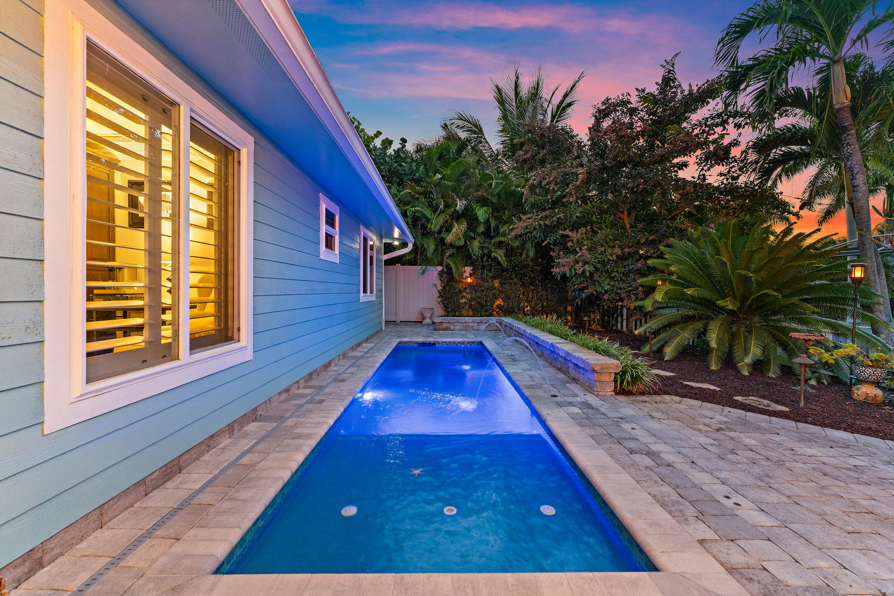 581 Southwest Timber Trail Stuart, FL 34997 - Photo 11 of 45 a view of balcony with wooden floor and outdoor space