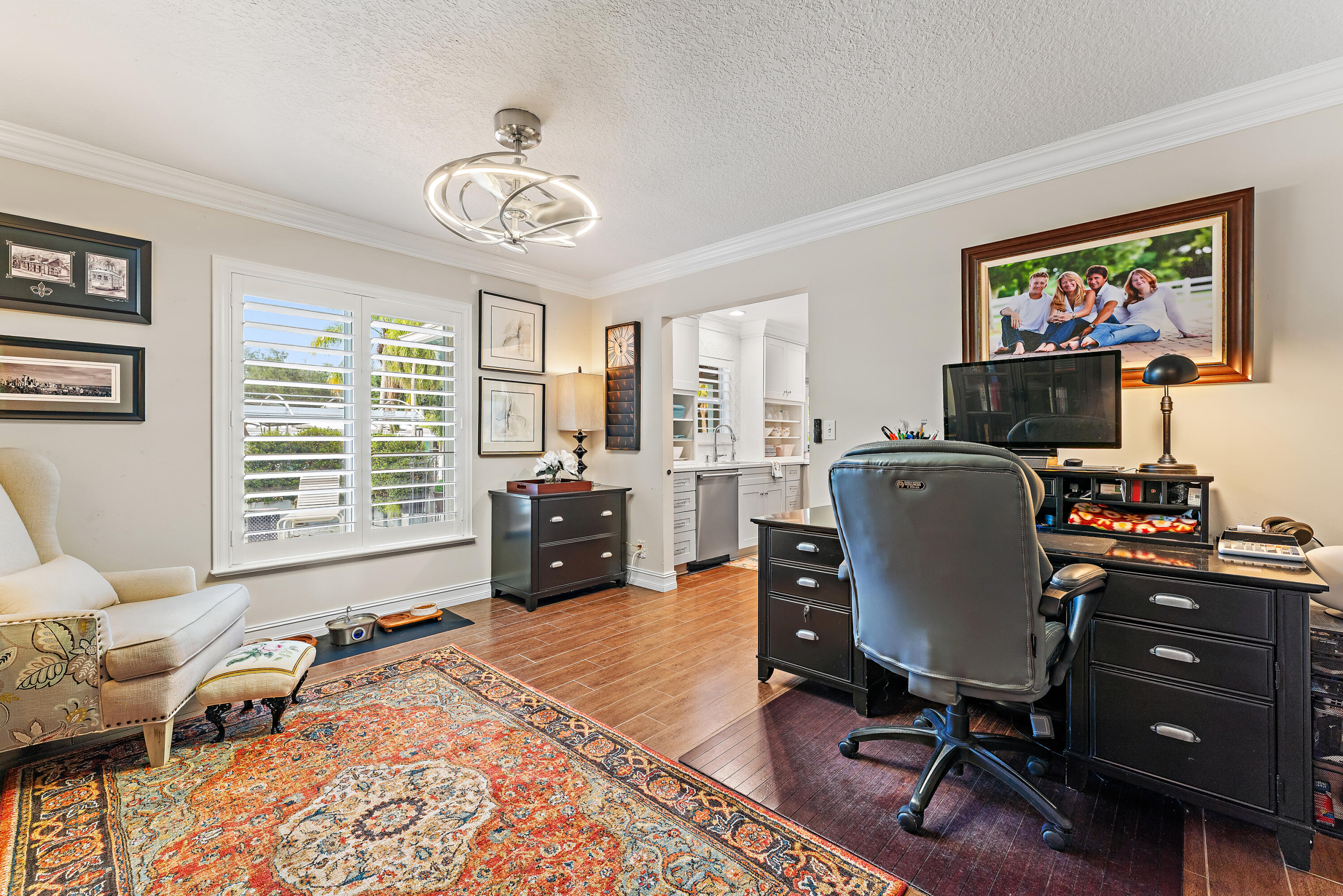 581 Southwest Timber Trail Stuart, FL 34997 - Photo 29 of 45 a view of a workspace with furniture and a window