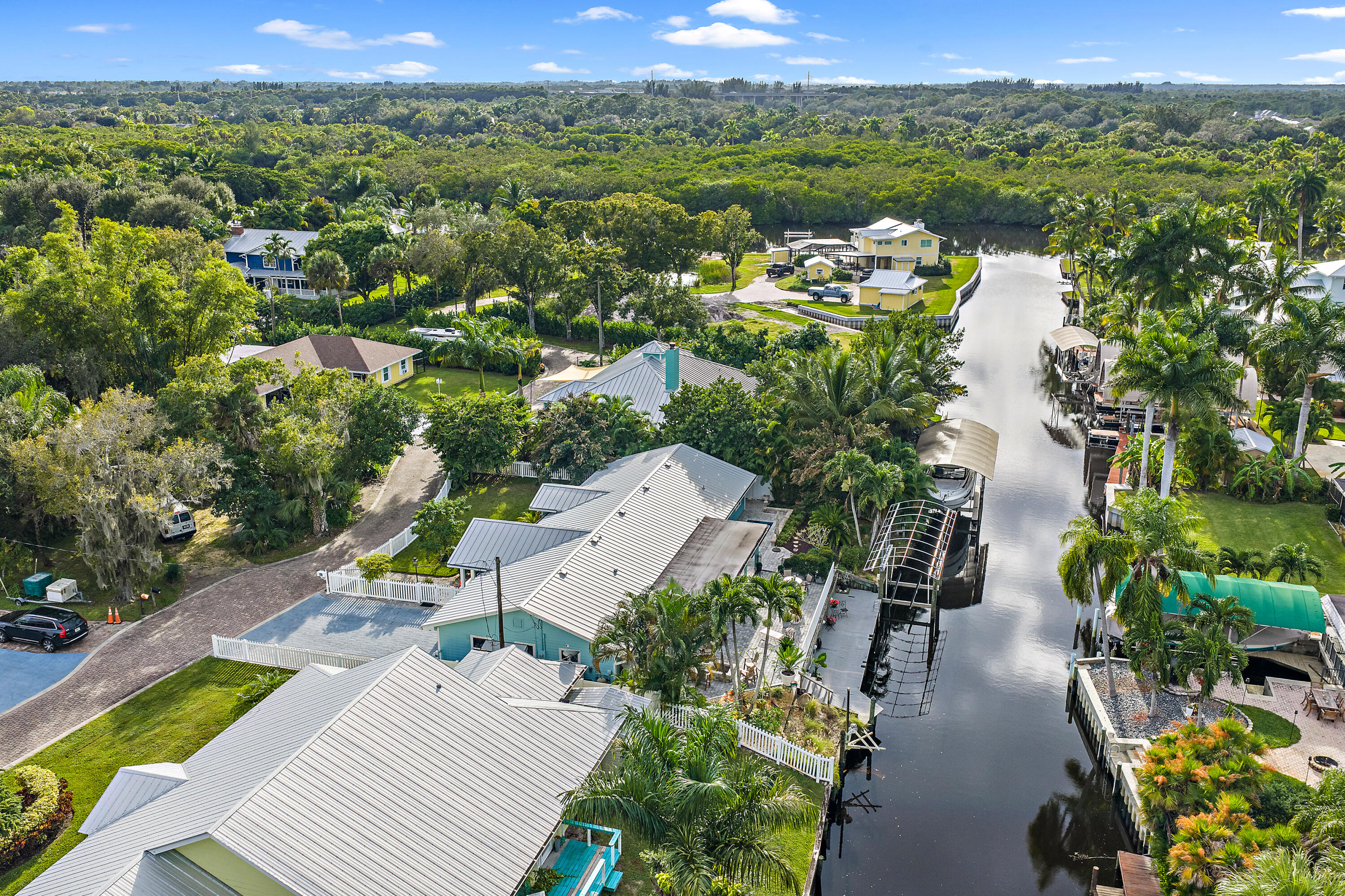 581 Southwest Timber Trail Stuart, FL 34997 - Photo 3 of 45 a view of a garden with a lake view
