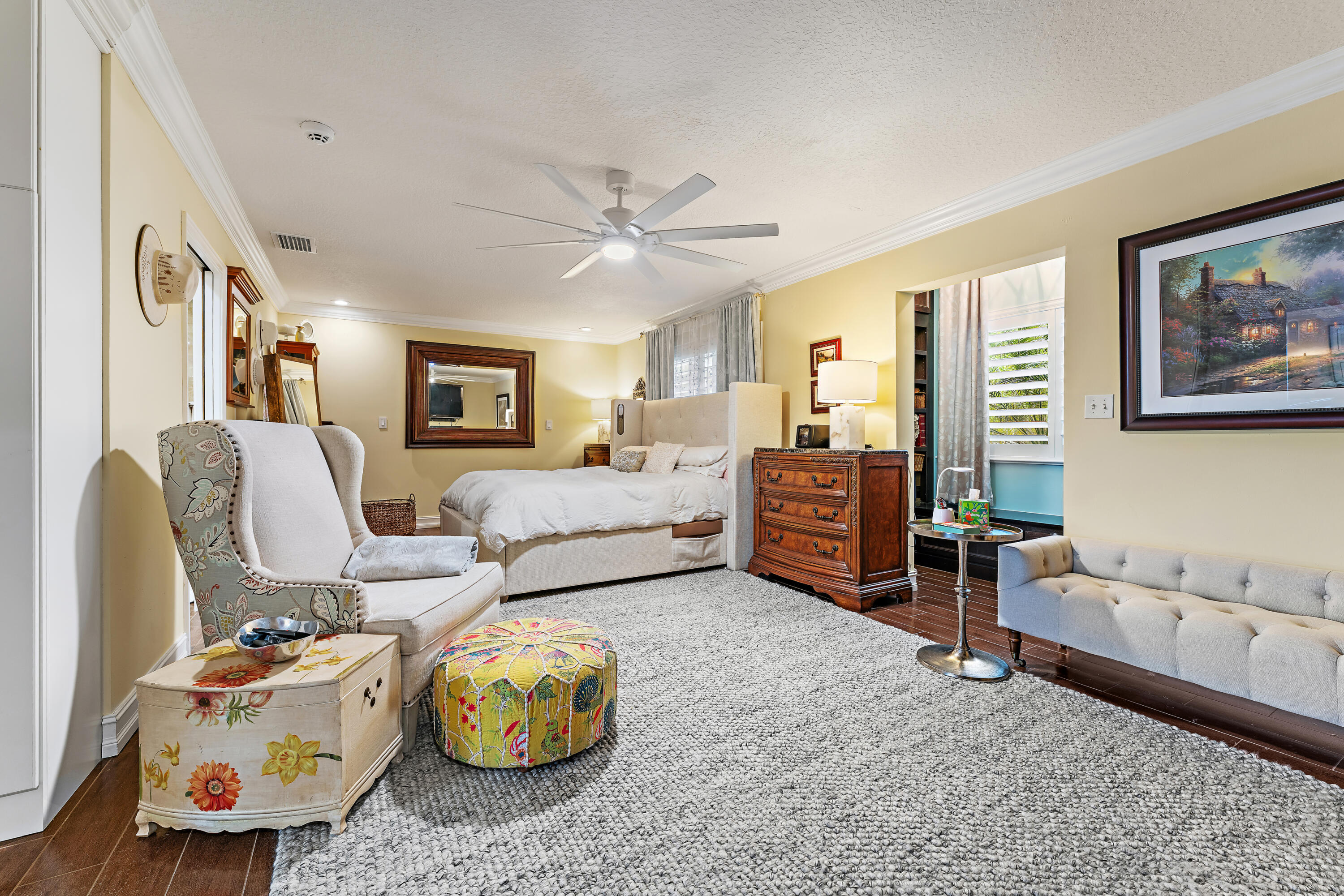 581 Southwest Timber Trail Stuart, FL 34997 - Photo 33 of 45 a living room with furniture and a chandelier