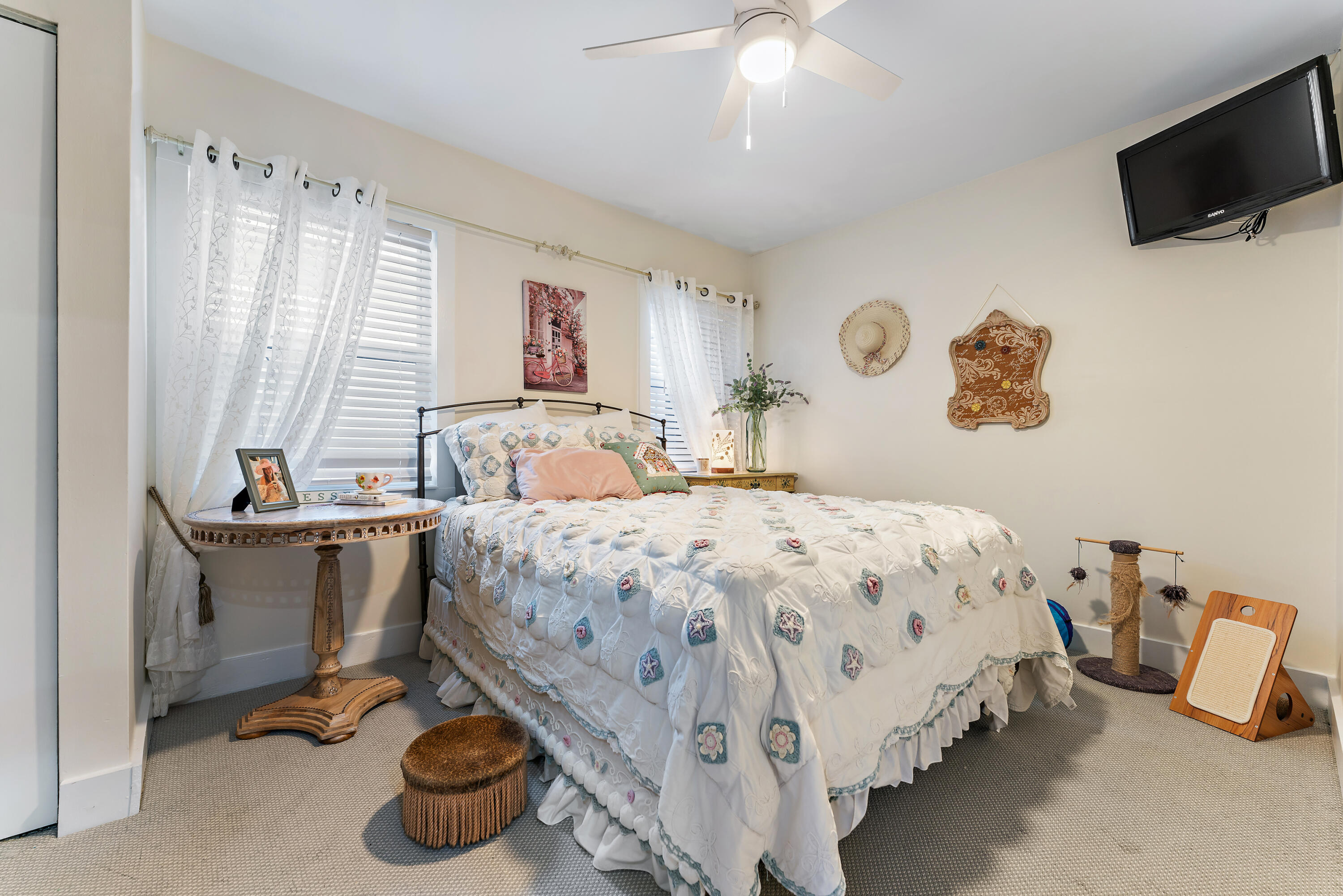 581 Southwest Timber Trail Stuart, FL 34997 - Photo 40 of 45 a bedroom with a bed and flat screen tv