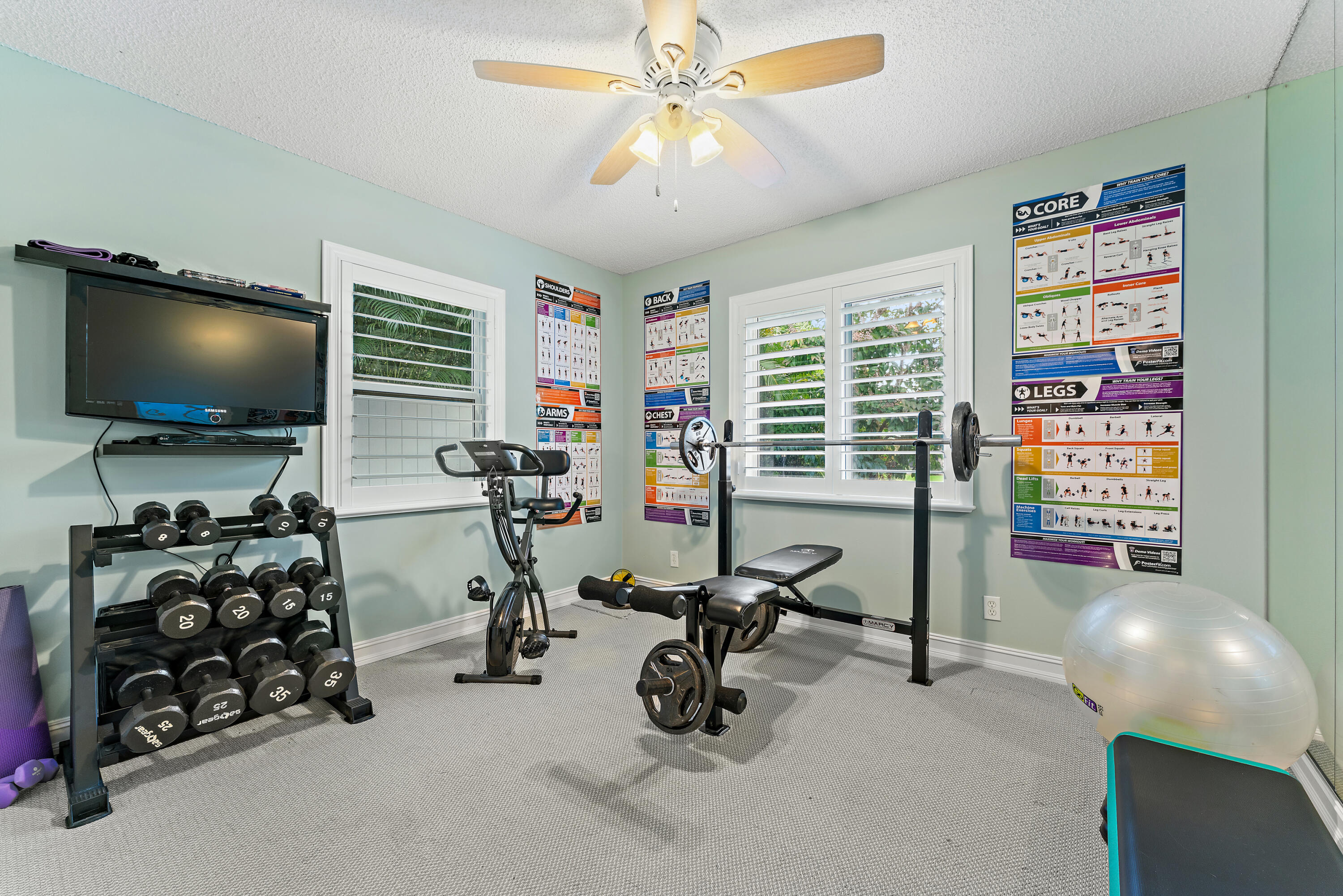 581 Southwest Timber Trail Stuart, FL 34997 - Photo 41 of 45 a view of a livingroom with workspace and a window