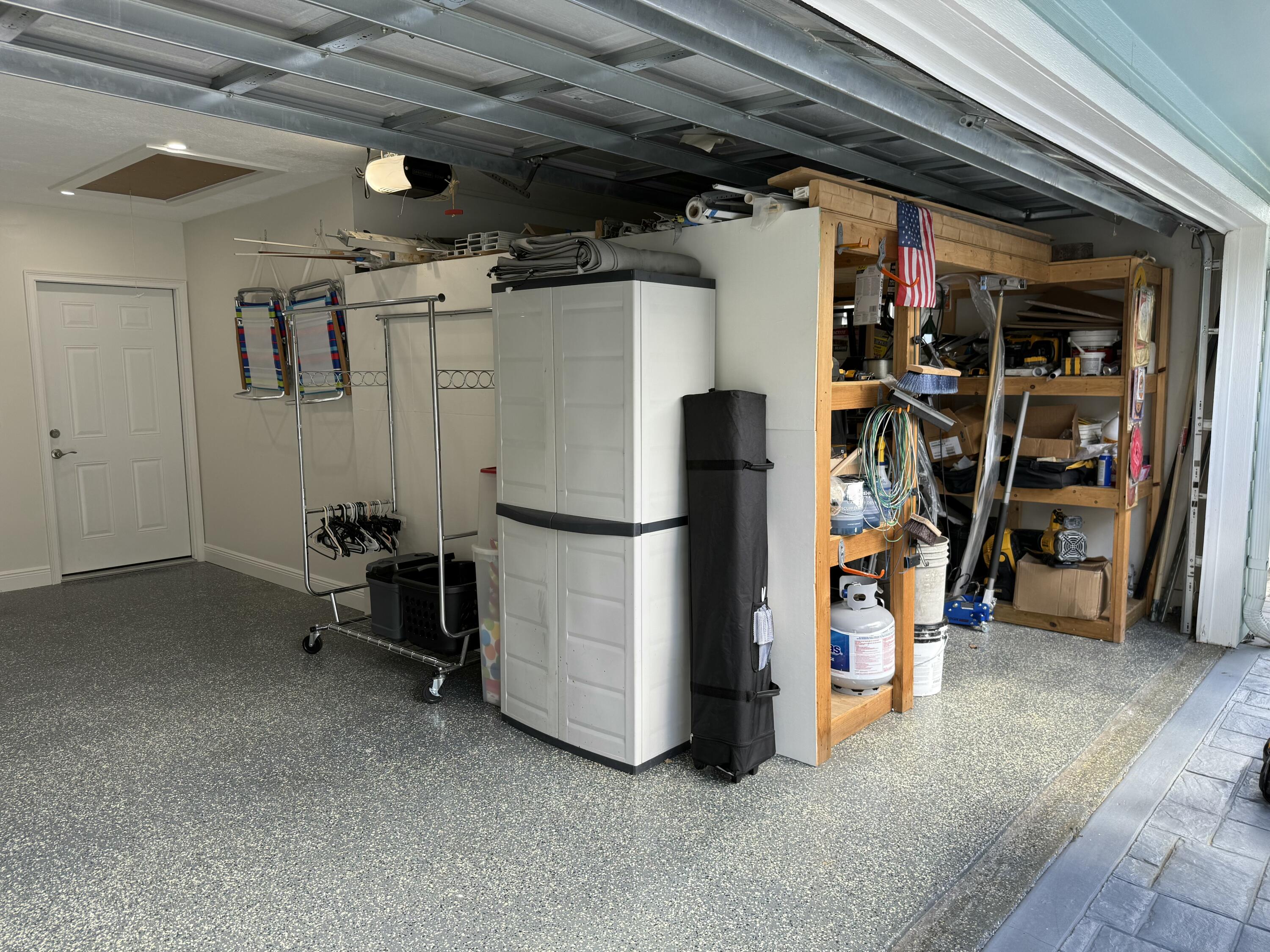 581 Southwest Timber Trail Stuart, FL 34997 - Photo 45 of 45 a view of a storage room with shelves