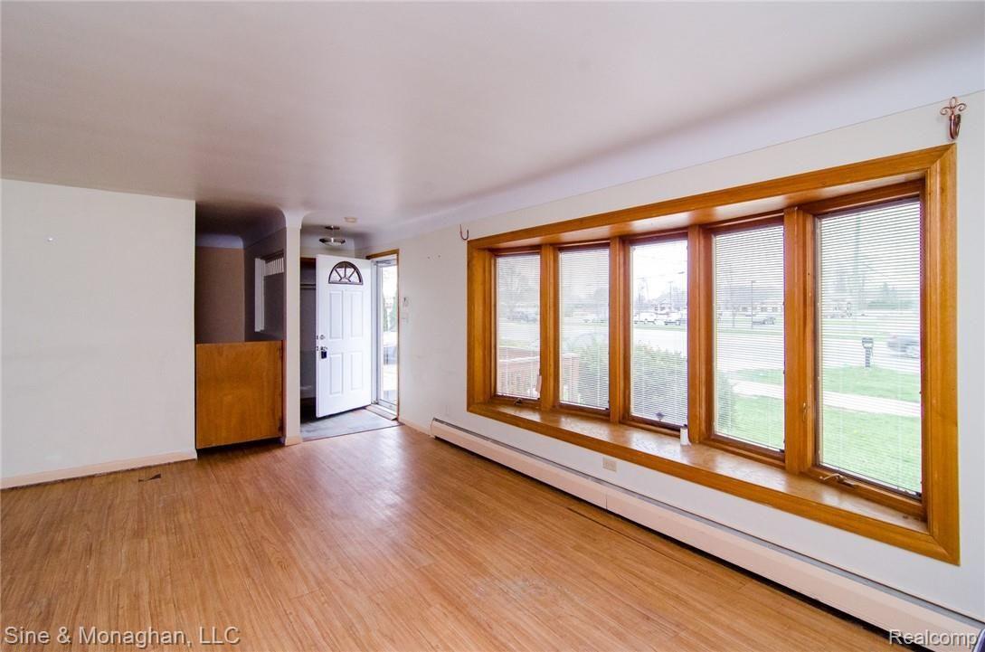 2909 East Wattles Road Troy, MI 48085 - Photo 2 of 28 Expansive bay window in living room