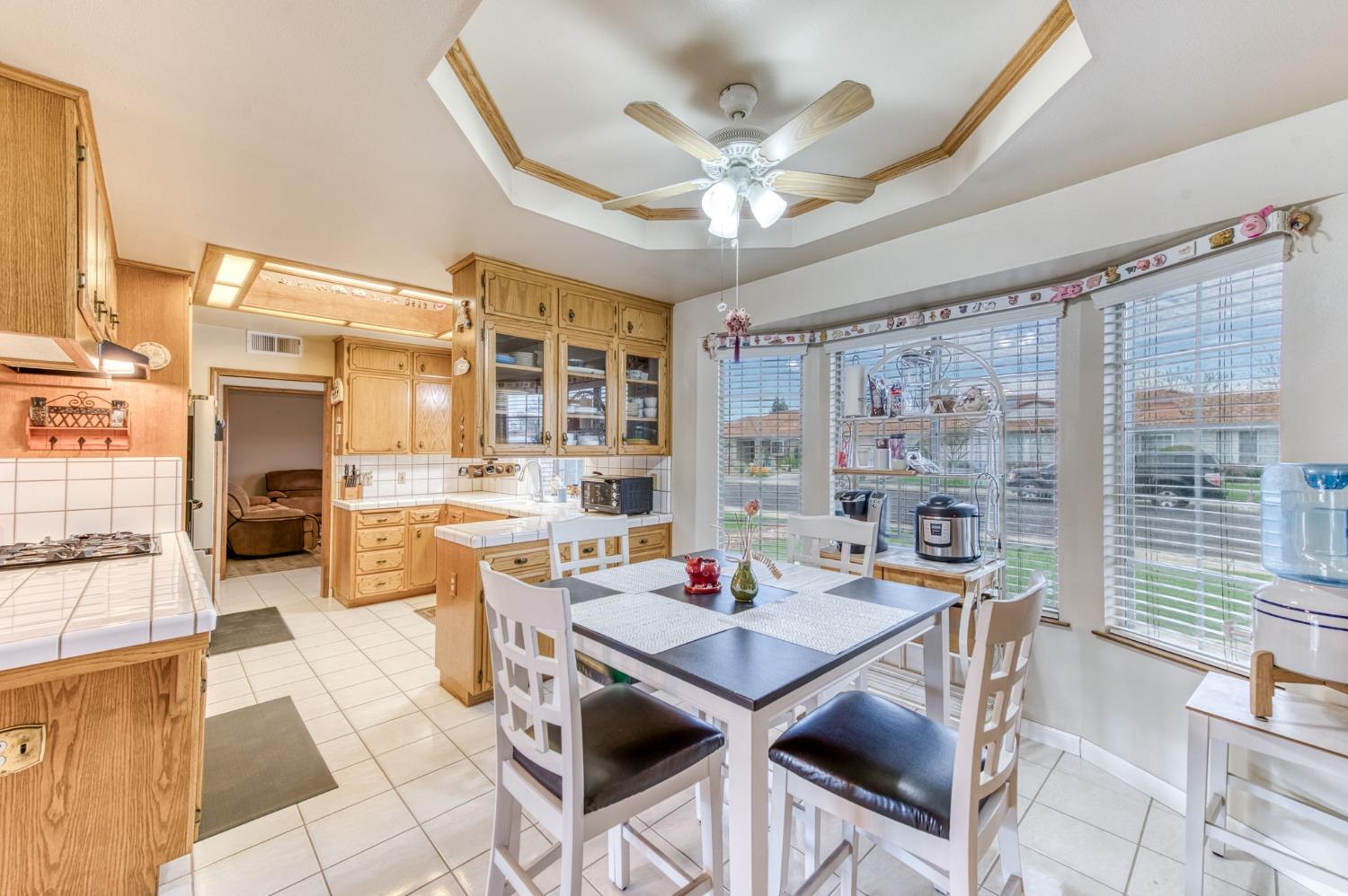 2367 Frederick Way Madera, CA 93637 - Photo 13 of 30 a view of a dining room with furniture window and outside view
