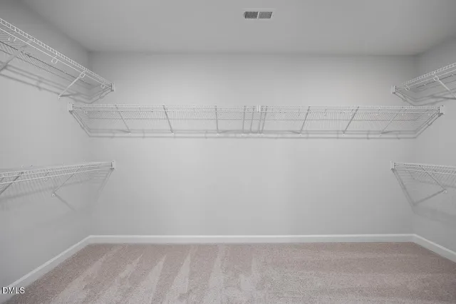 a view of a room with racks on the wall