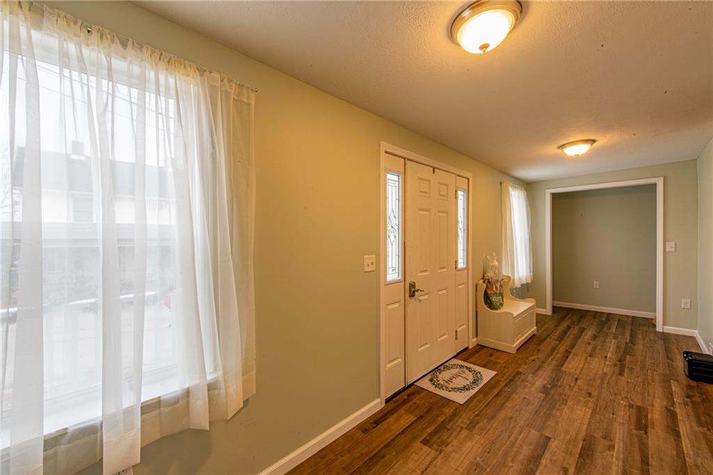 44 Rowe Street Rural Ridge, PA 15075 - Photo 2 of 25 a view of a room with wooden floor and bathroom