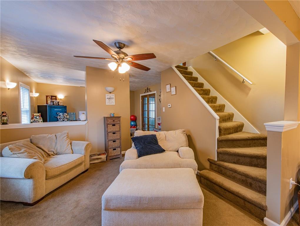 44 Rowe Street Rural Ridge, PA 15075 - Photo 15 of 25 a living room with furniture and a ceiling fan