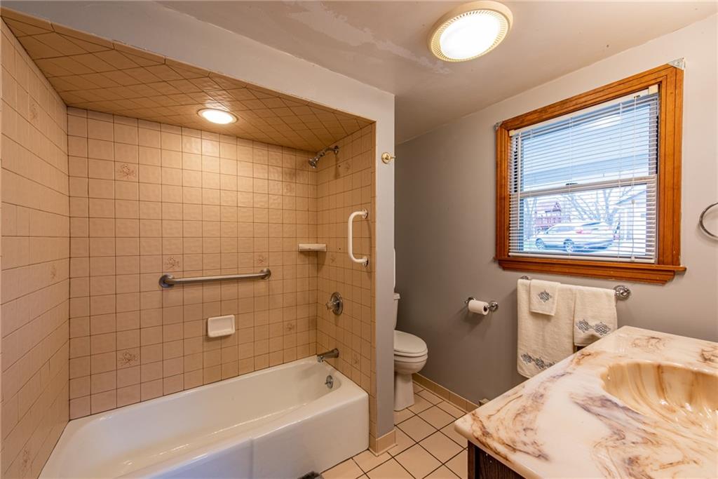 44 Rowe Street Rural Ridge, PA 15075 - Photo 16 of 25 a bathroom with a sink and bathtub