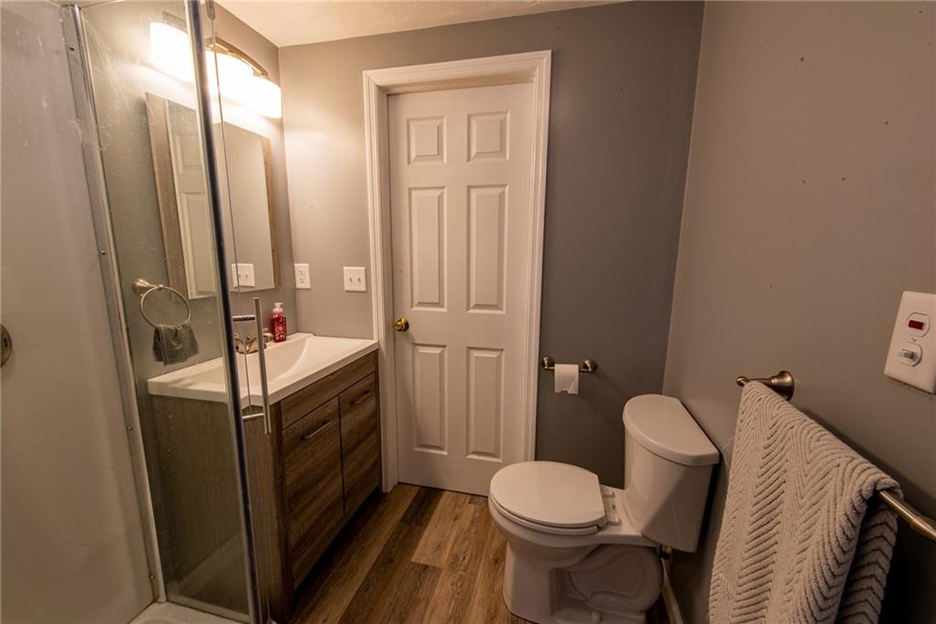 44 Rowe Street Rural Ridge, PA 15075 - Photo 19 of 25 a bathroom with a sink toilet and shower