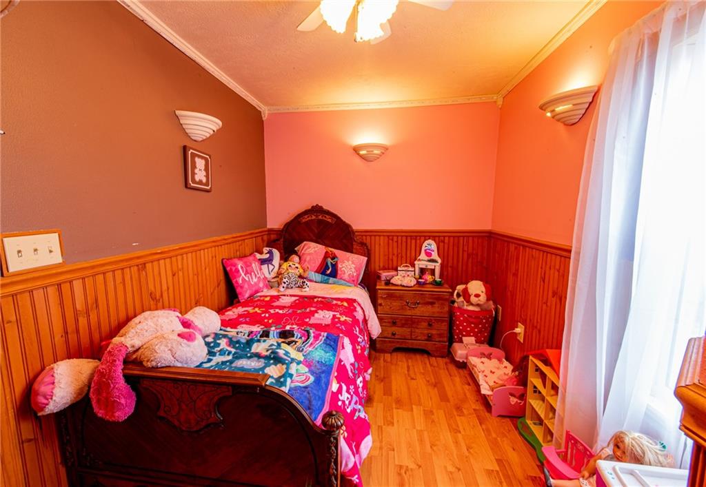 44 Rowe Street Rural Ridge, PA 15075 - Photo 21 of 25 a bedroom with a bed and a window