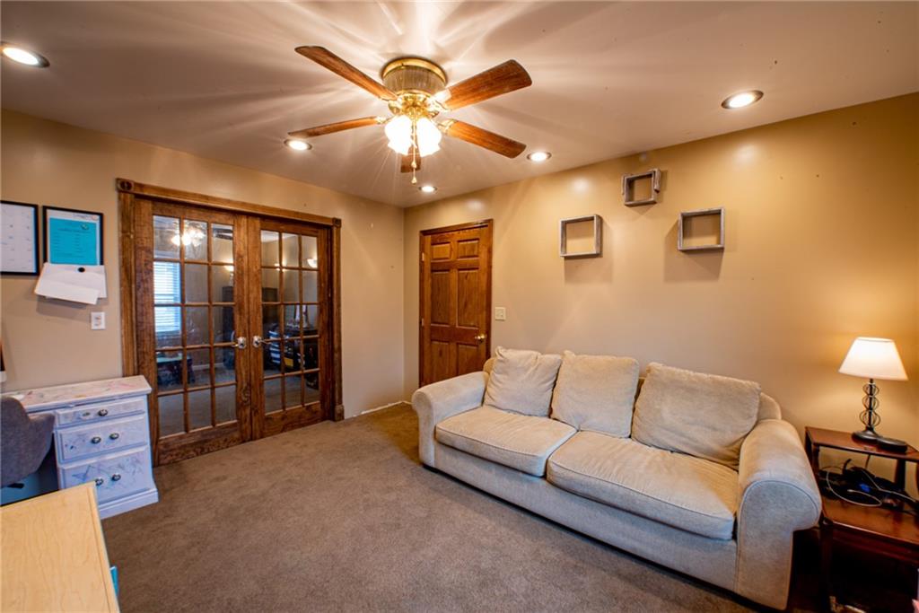 44 Rowe Street Rural Ridge, PA 15075 - Photo 10 of 25 a living room with furniture and chandelier