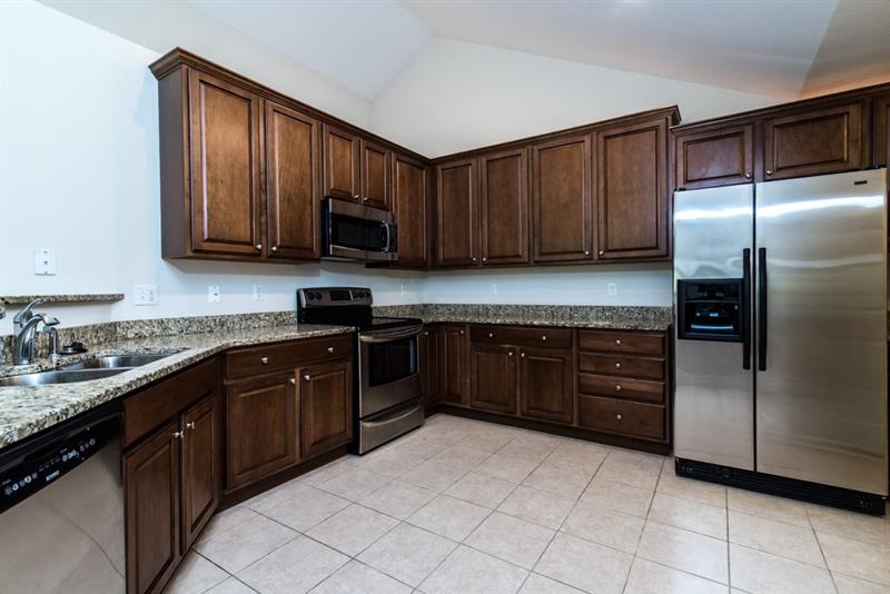 1073 Wealdstone Road Cranberry Township, PA 16066 - Photo 11 of 25 View of the Kitchen showing 42" cabinets, granite counter tops and ceramic floor