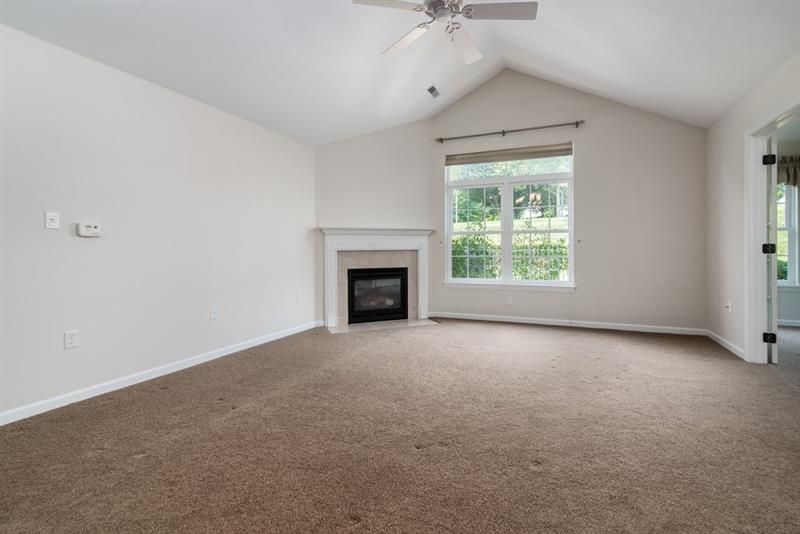 1073 Wealdstone Road Cranberry Township, PA 16066 - Photo 6 of 25 Living room open to sun room and dining area