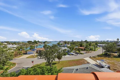 an aerial view of a city with lots of residential buildings