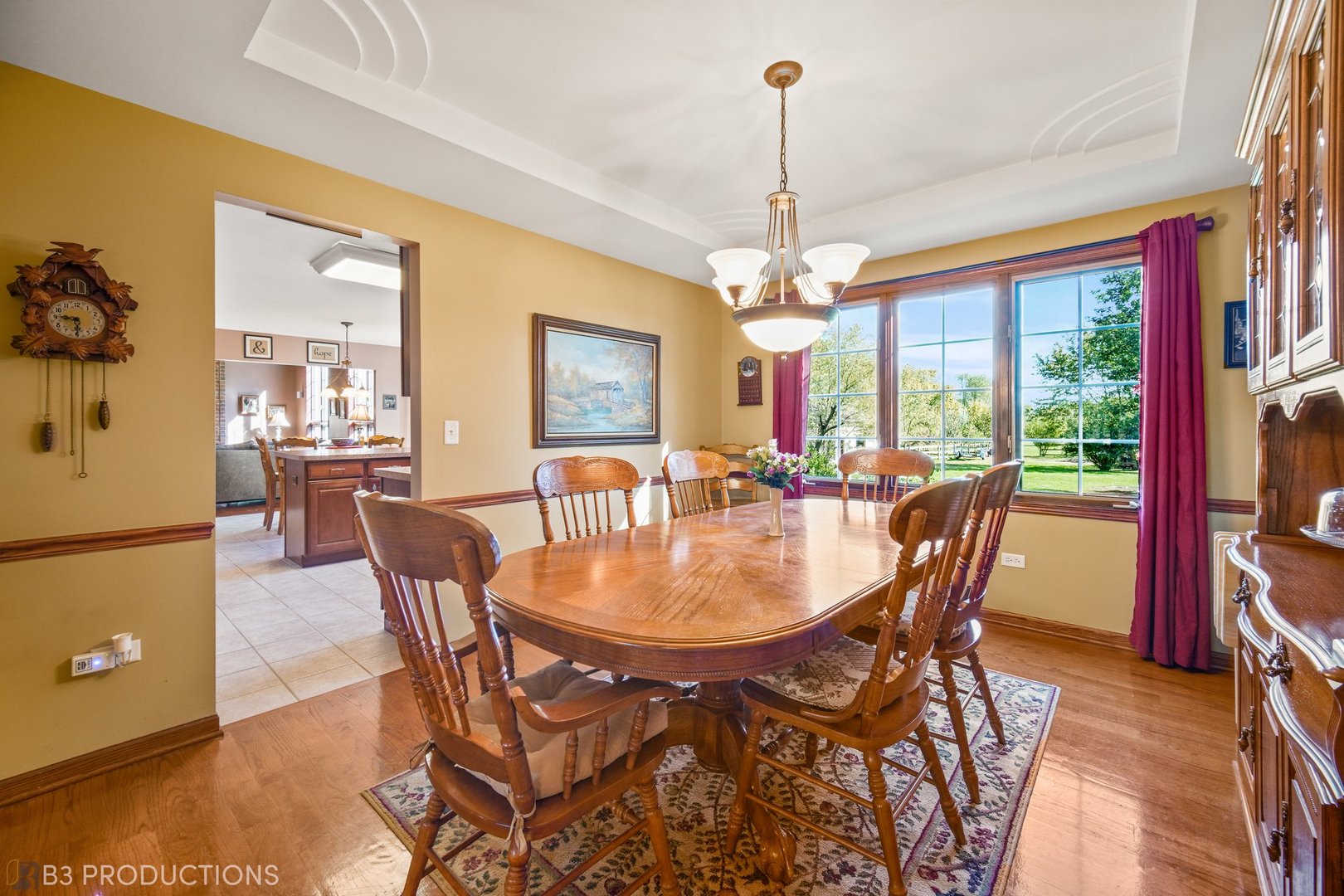 27325 South Kuersten Road Monee, IL 60449 - Photo 12 of 30 a dining room with furniture a chandelier and wooden floor