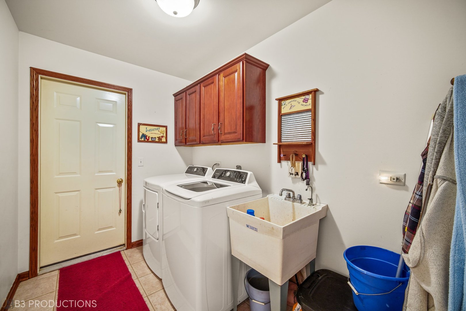 27325 South Kuersten Road Monee, IL 60449 - Photo 24 of 30 a utility room with sink a washer and dryer