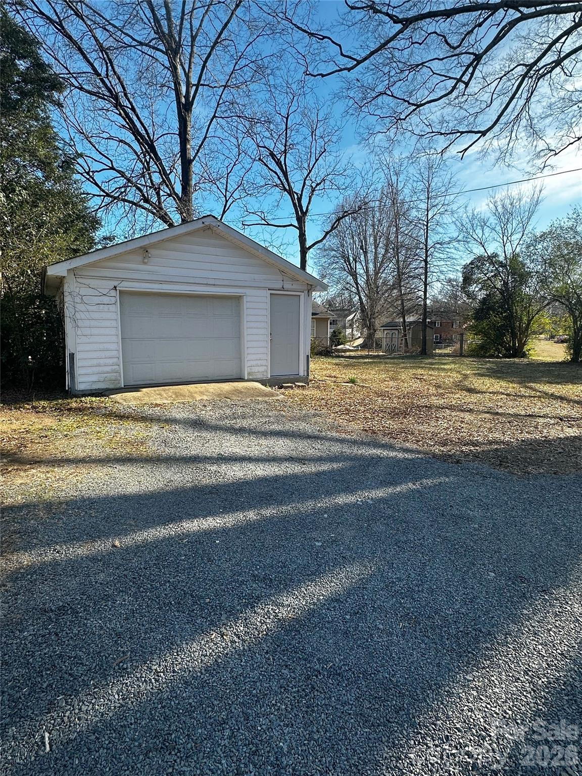 1803 West Main Street Albemarle, NC 28001 - Photo 12 of 13 a house that has a tree in front of it
