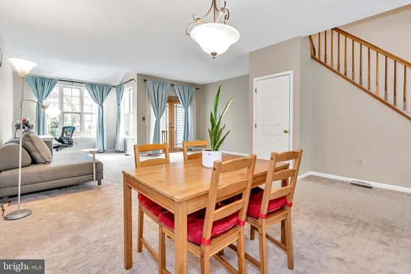 a view of a livingroom with furniture and window