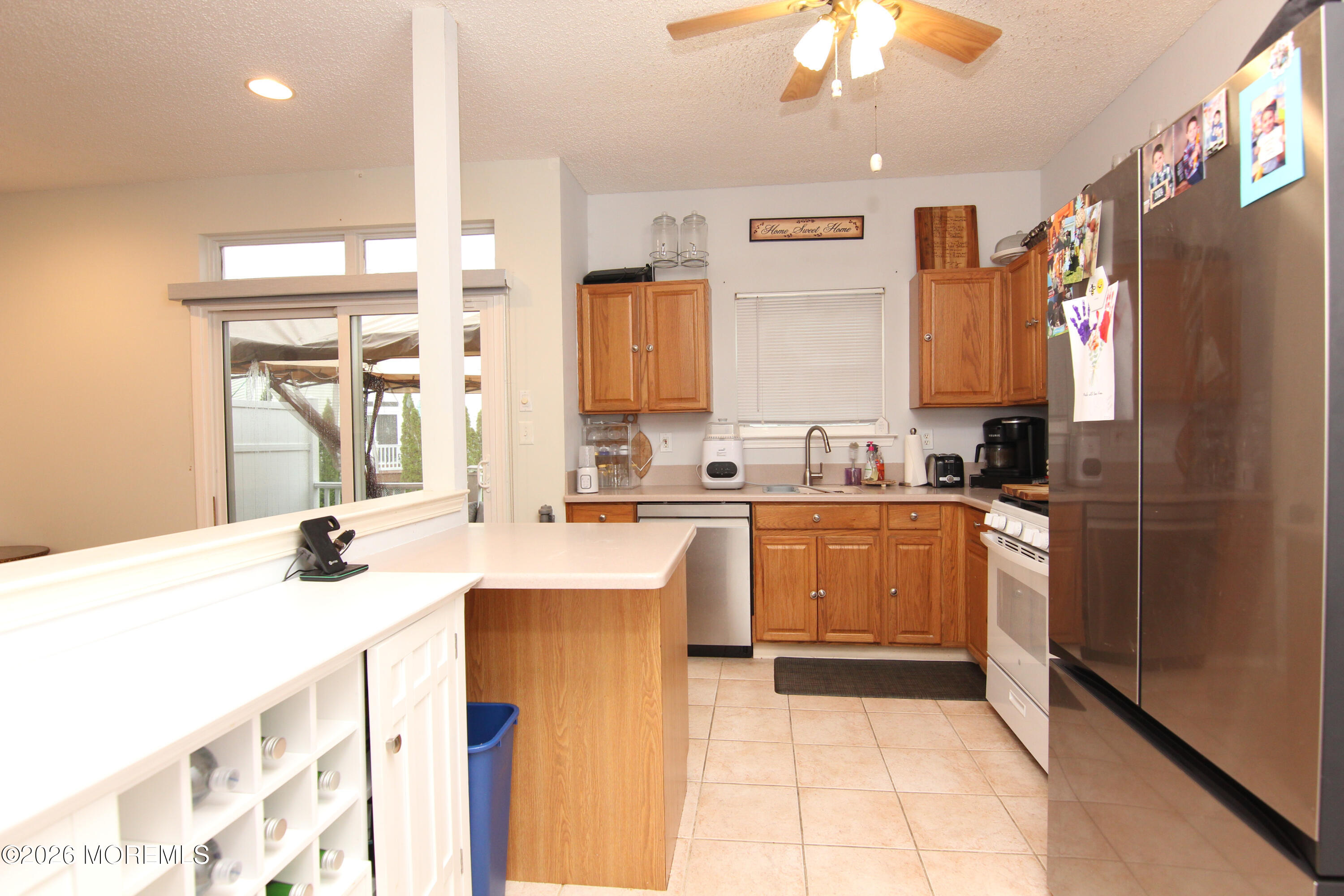 33 Austin Street Tinton Falls, NJ 07712 - Photo 39 of 46 a kitchen with a sink stove and refrigerator