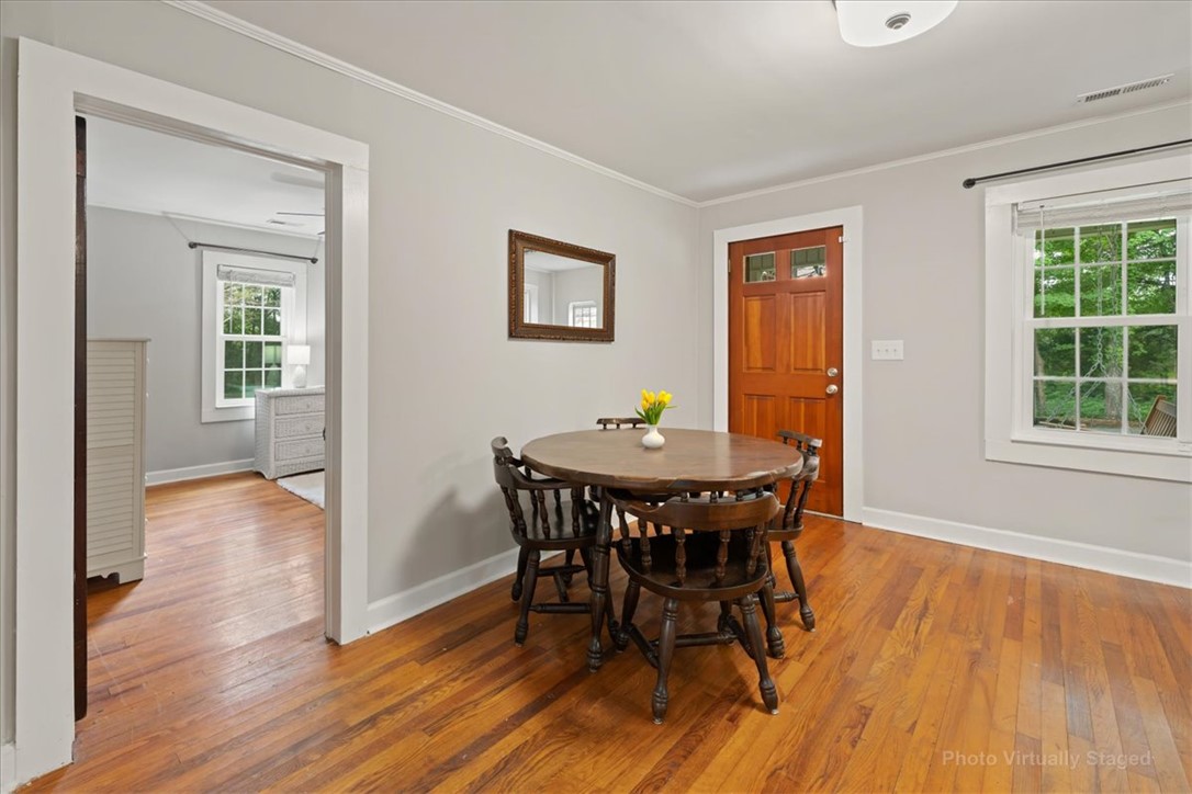 174 Holliday Road Six Mile, SC 29682 - Photo 8 of 49 Desirable original hardwood floors and abundant natural light create an inviting atmosphere