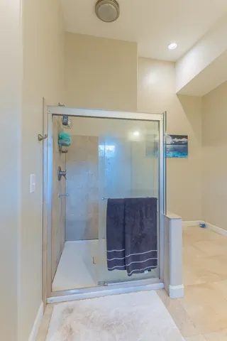 a room with a sink and a mirror