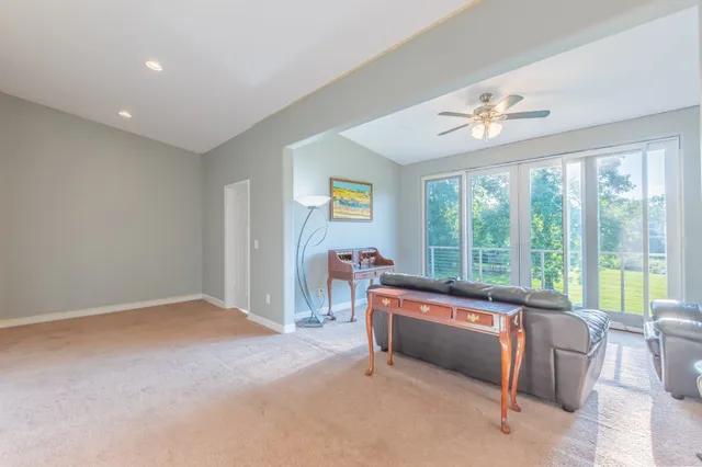 a bedroom with a bed and a lamp