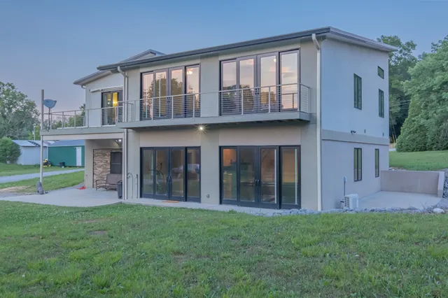 a view of a house with a big yard