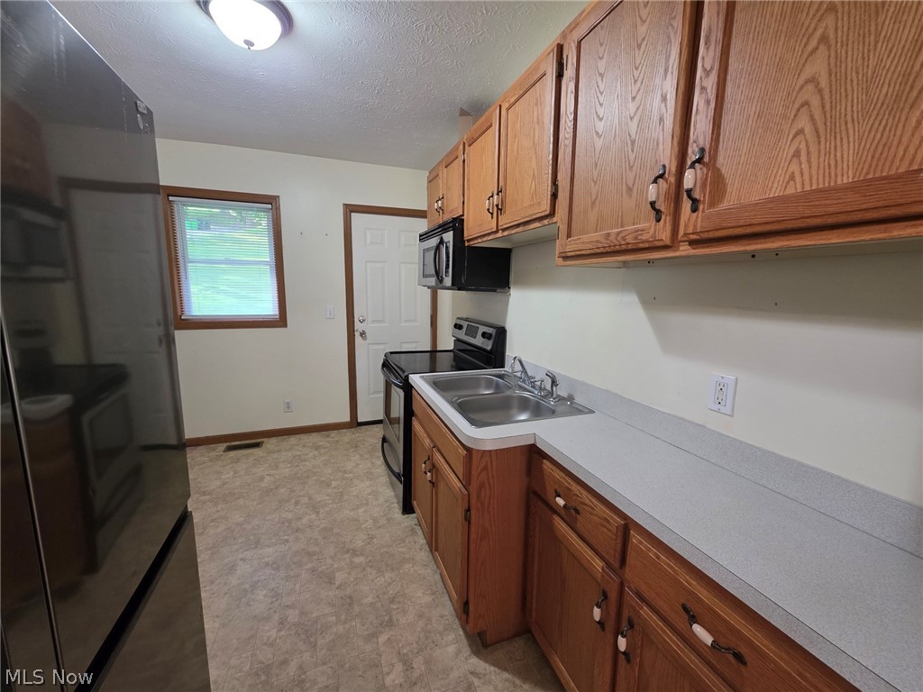 95 Erie Street Rittman, OH 44270 - Photo 5 of 25 Plenty of cupboards & counters