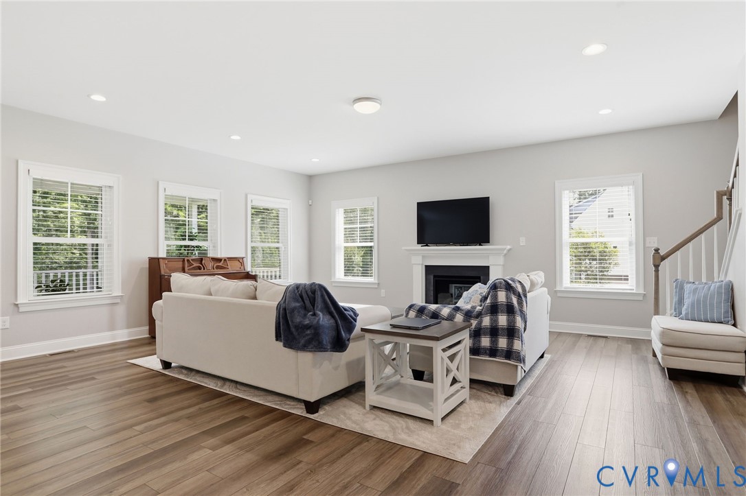 12040 Kenton Ridge Road Ashland, VA 23005 - Photo 25 of 54 Spacious living area featuring wood-finish floorin