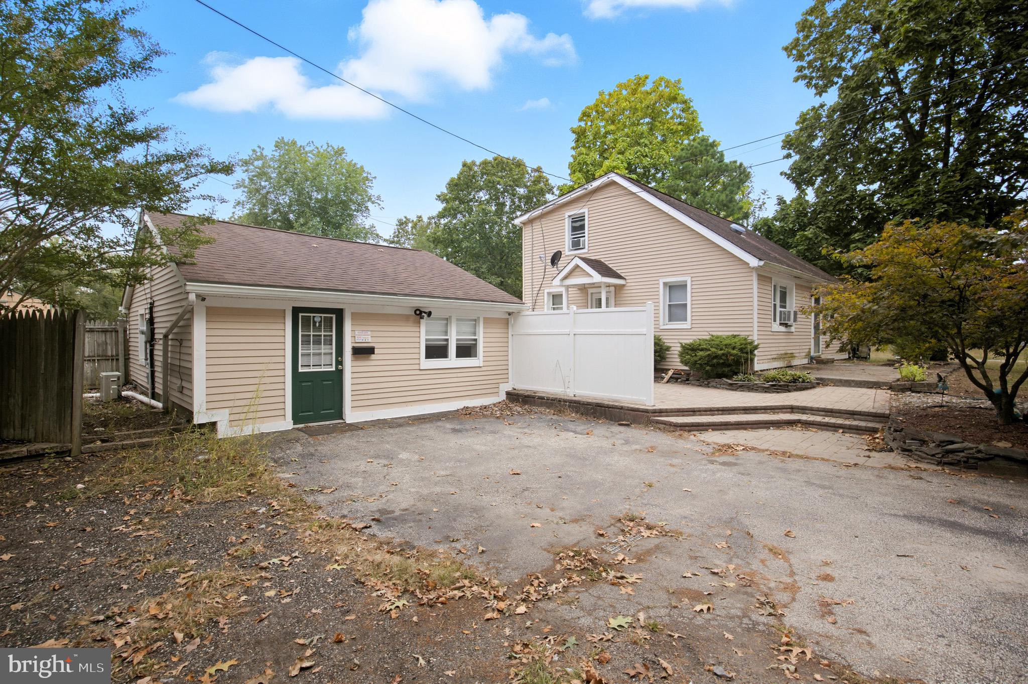 687 Jackson Road Atco, NJ 08004 - Photo 1 of 20 a view of a house with a yard and large tree