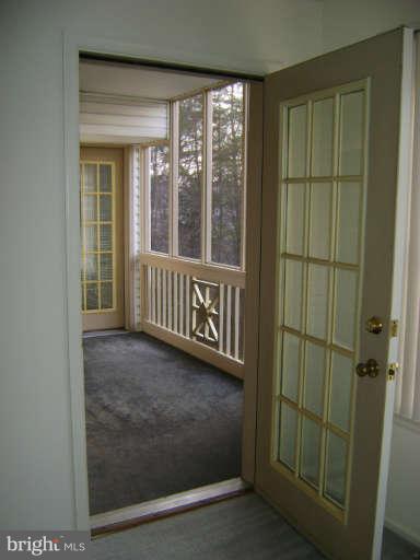 608 Churchill Road, Unit F Bel Air, MD 21014 - Photo 12 of 30 Door to Screened In Porch from Sunroom