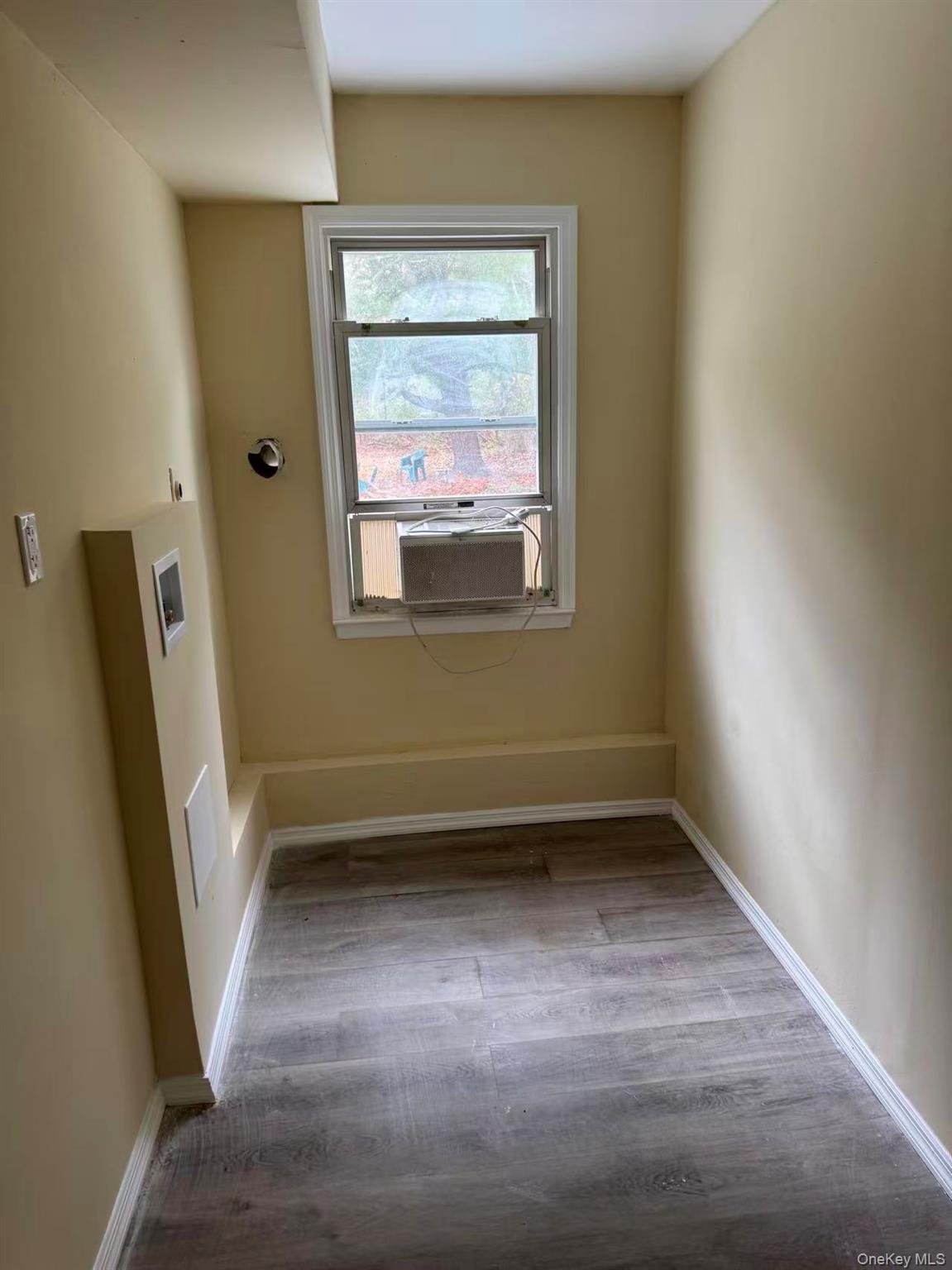 20 Westfield Road Coram, NY 11727 - Photo 16 of 21 a view of an empty room with a window
