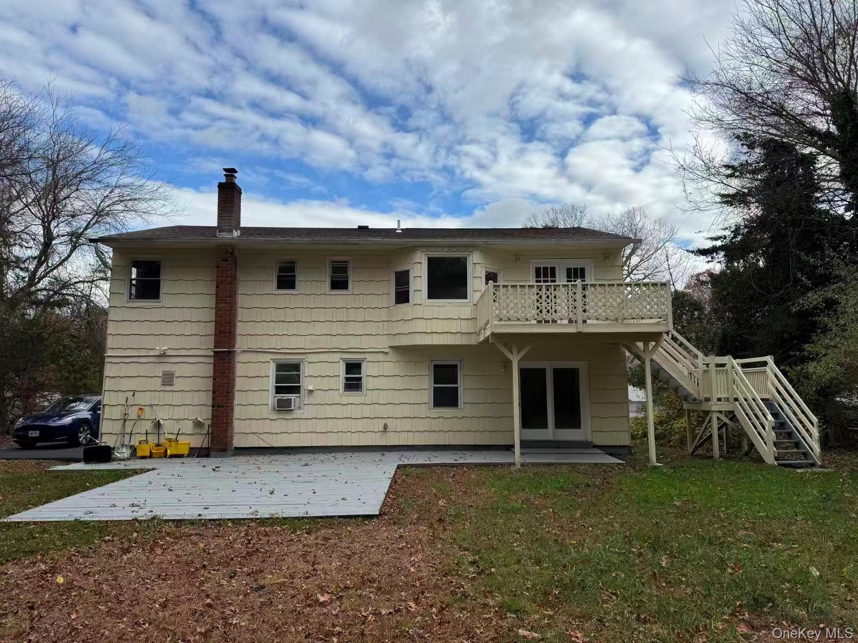 20 Westfield Road Coram, NY 11727 - Photo 17 of 21 a front view of a house with a yard