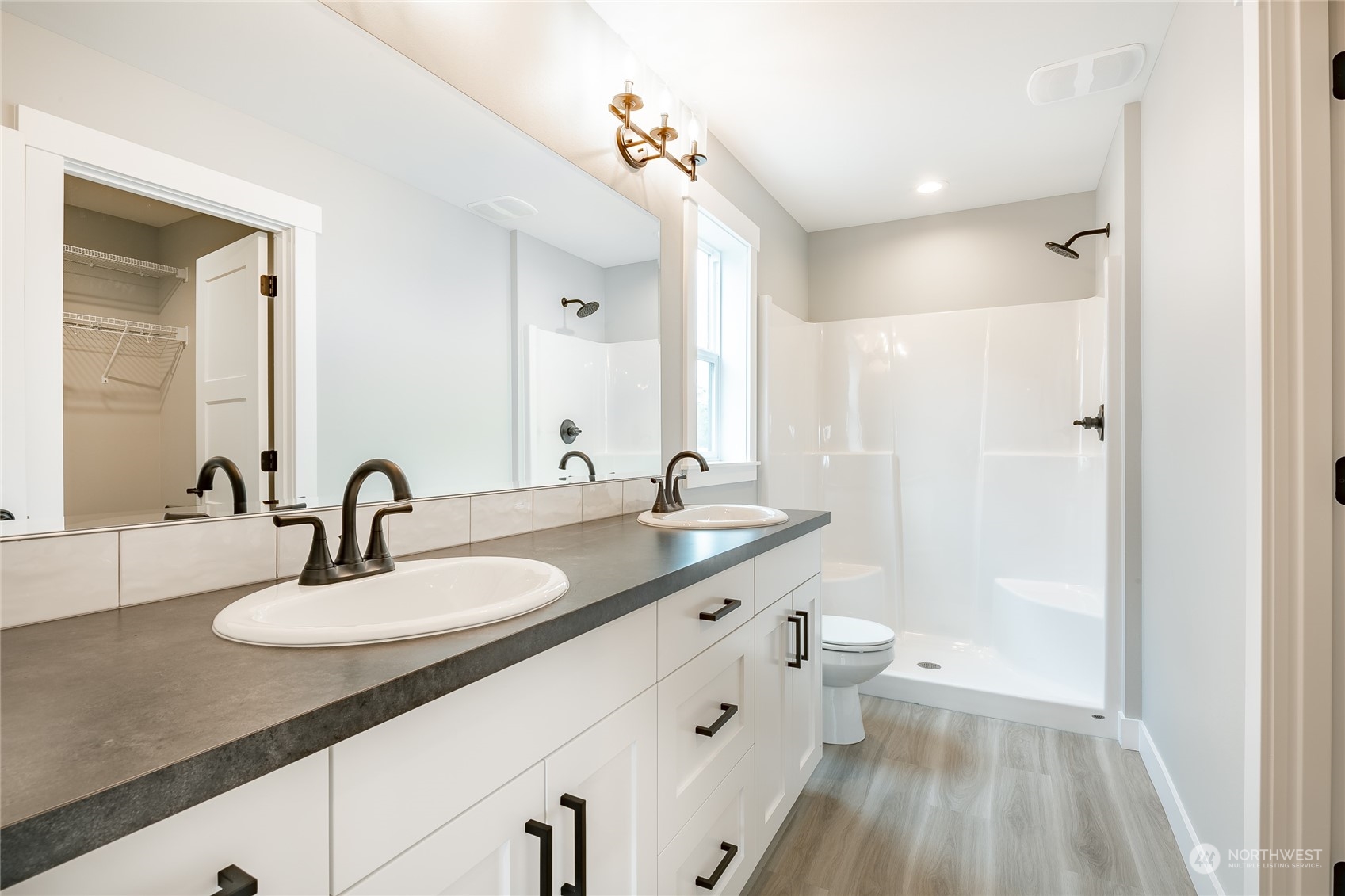 1517 Hovel Road Sumas, WA 98295 - Photo 11 of 17 a bathroom with a double vanity sink and a mirror