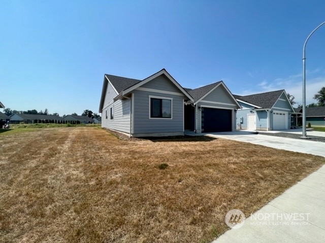 1517 Hovel Road Sumas, WA 98295 - Photo 3 of 17 a house with river in front of it