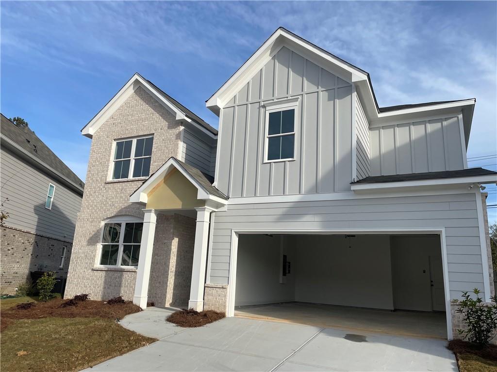 3648 Silvery Way Powder Springs, GA 30127 - Photo 1 of 1 a front view of a house with a garage