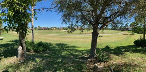 a view of an ocean with a yard