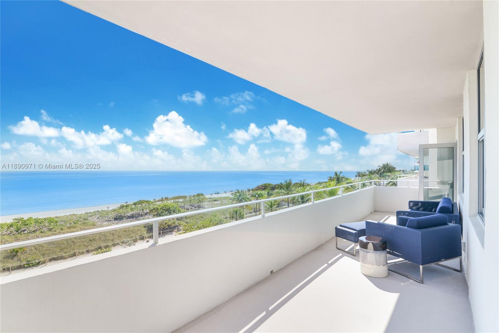 9225 Collins Avenue, Unit 501 Surfside, FL 33154 - Photo 9 of 12 a view of balcony with furniture and city view