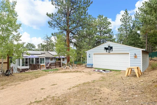 a house with trees in front of it
