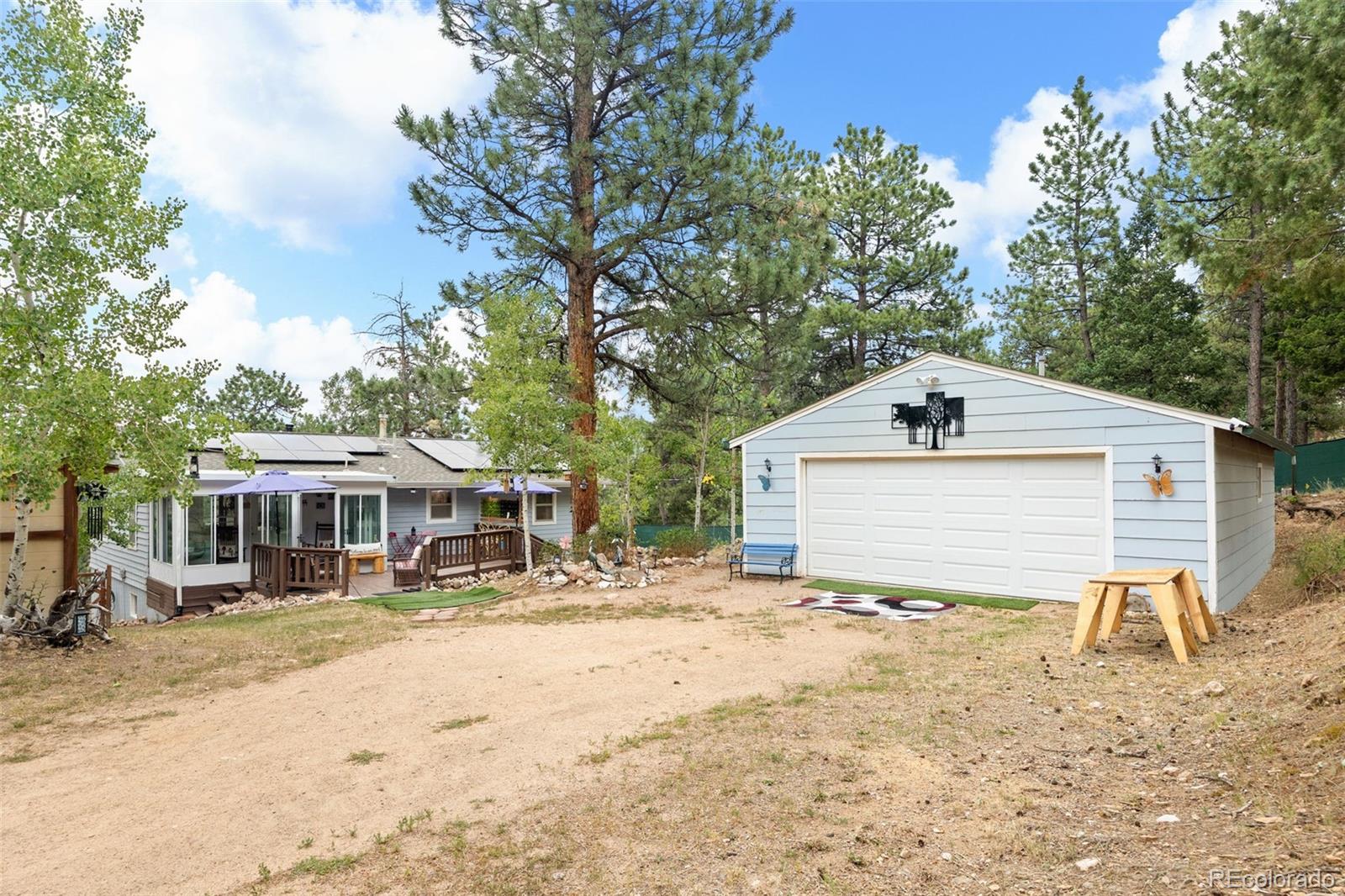 a house with trees in front of it