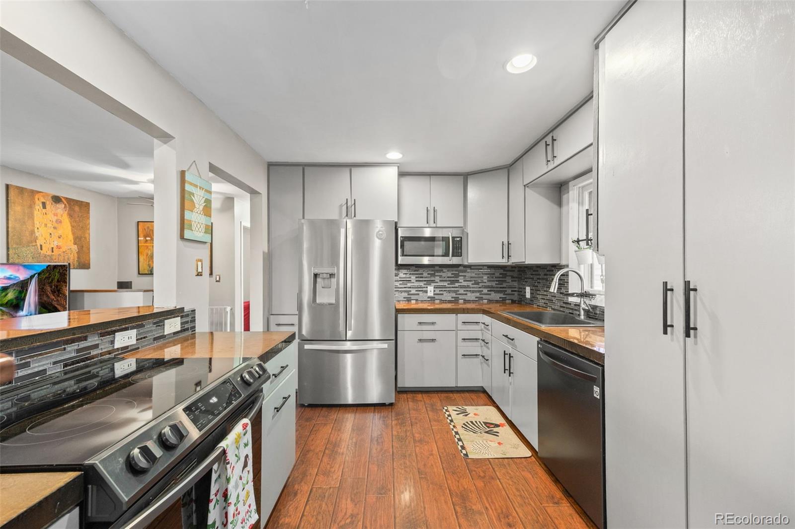 41 Yew Lane Bailey, CO 80421 - Photo 15 of 47 a large kitchen with stainless steel appliances granite countertop a stove and a refrigerator
