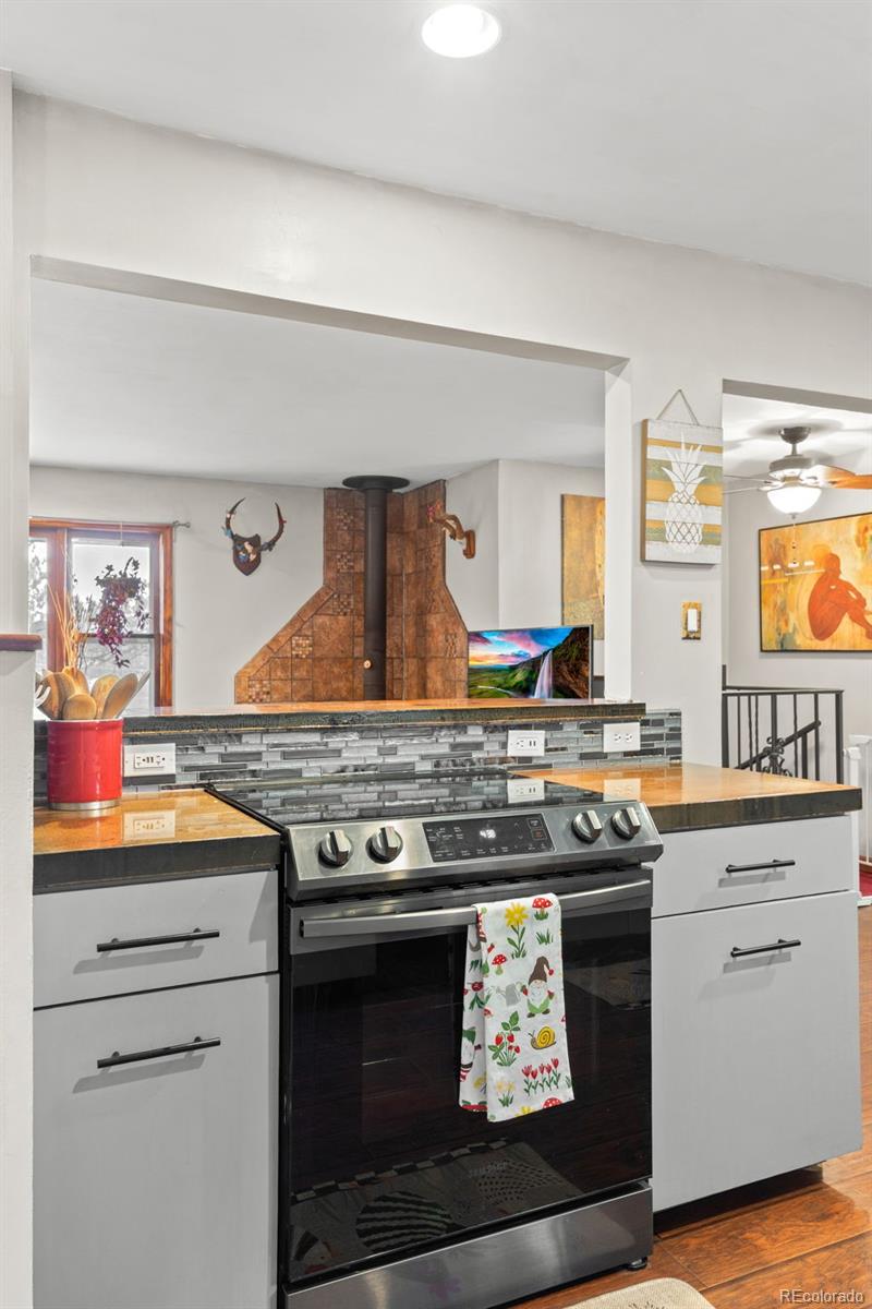 41 Yew Lane Bailey, CO 80421 - Photo 19 of 47 a stove top oven sitting inside of a kitchen