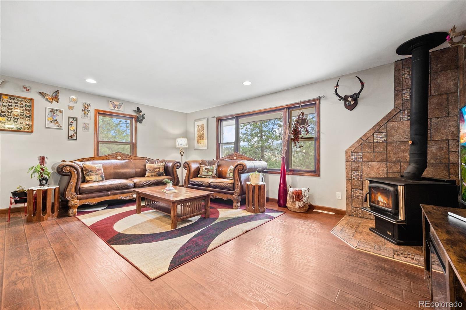41 Yew Lane Bailey, CO 80421 - Photo 24 of 47 a living room with furniture window and wooden floor