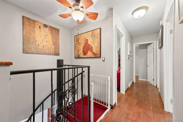 a view of an entryway with wooden floor
