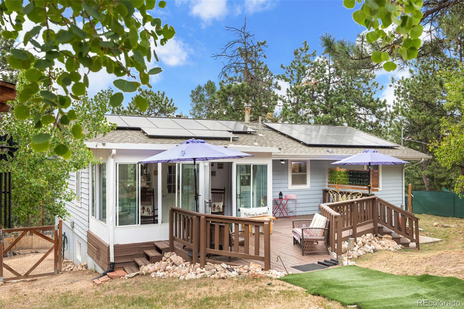 41 Yew Lane Bailey, CO 80421 - Photo 3 of 47 a view of a house with a patio