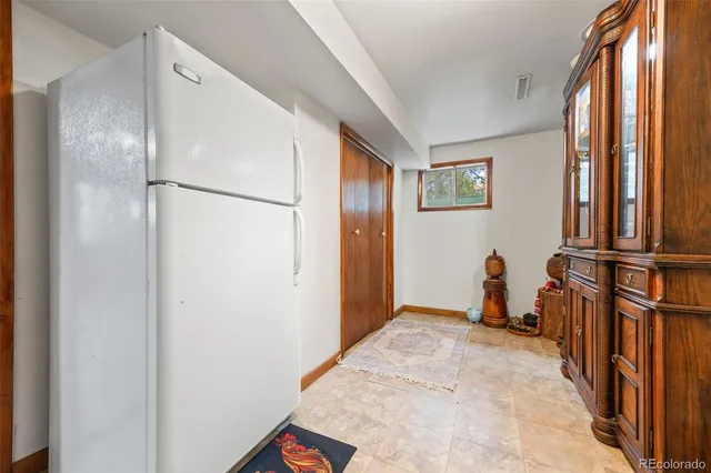 a view of a hallway with a window