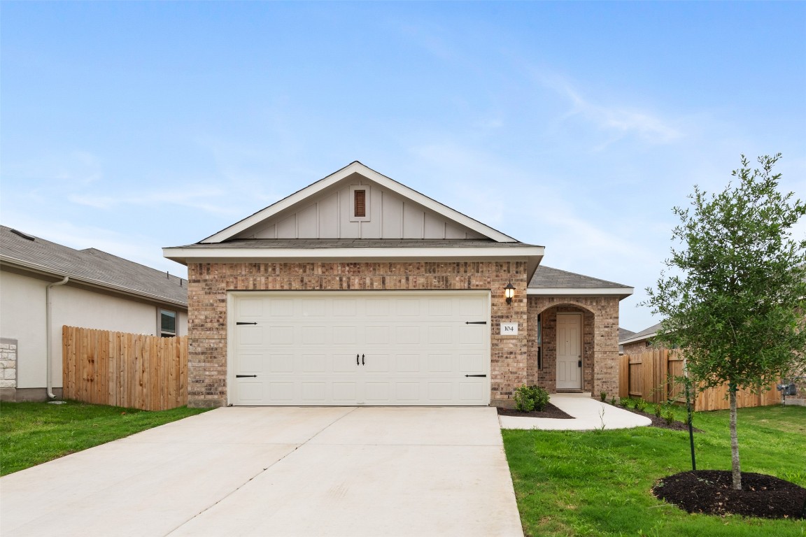 104 Otella Street Georgetown, TX 78628 - Photo 1 of 1 a front view of a house with a yard
