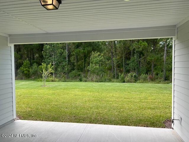 47 Archstone Way Street, Unit 3 St. Augustine, FL 32092 - Photo 11 of 19 a view of a yard with an outdoor space